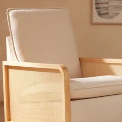 Babyletto Sumba Swivel Glider With Cane - Performance Cream Eco-Weave/Light Wood Base -Babyletto Store GUEST f8bf8c3a 7904 4e54 9a26 ae05ee47d3d1